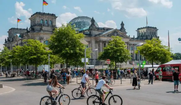 berlin-reichstag-bicycles People with bicycles in front of Reichstag, the German parliament, in Berlin, Germany